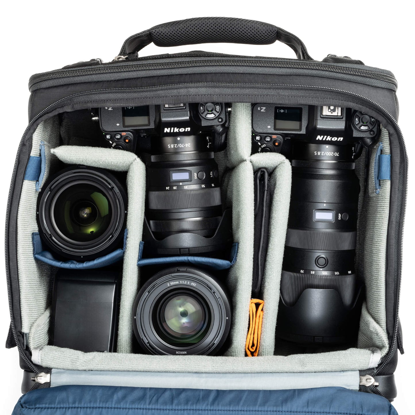 
                  
                    2 gripped camera bodies with lenses attached, 1-2 additional lenses, and/or two flashes 
                  
                