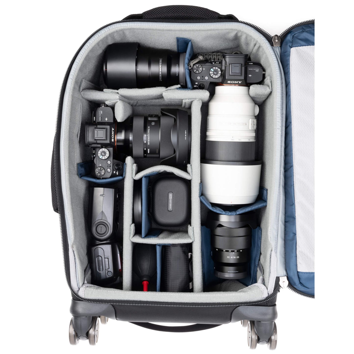 
                  
                    1 gripped camera body and 1 ungripped camera body both with
lenses attached
                  
                