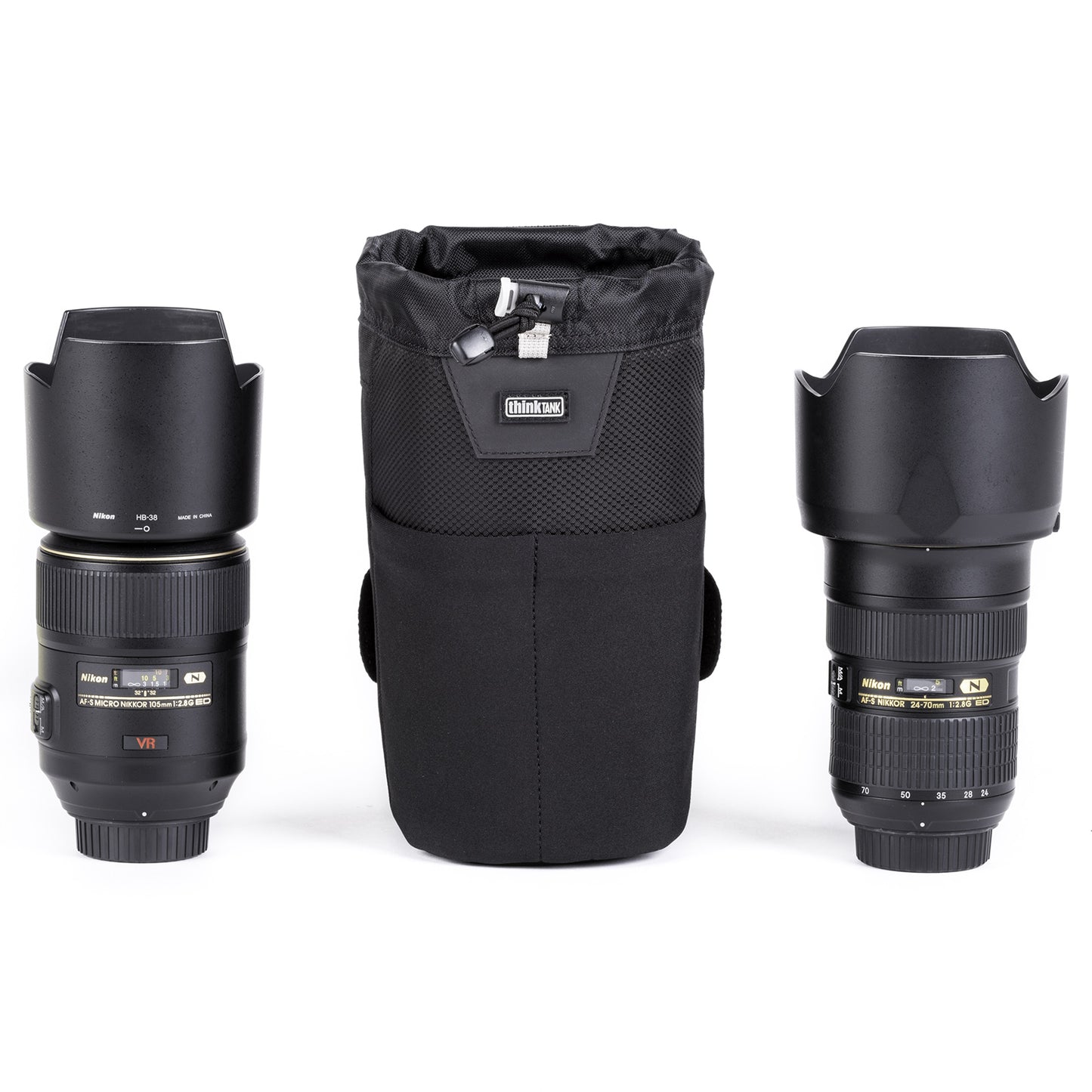 Holds a 24–70mm f/2.8 lens with lens hood in shooting position, or other similar size lenses