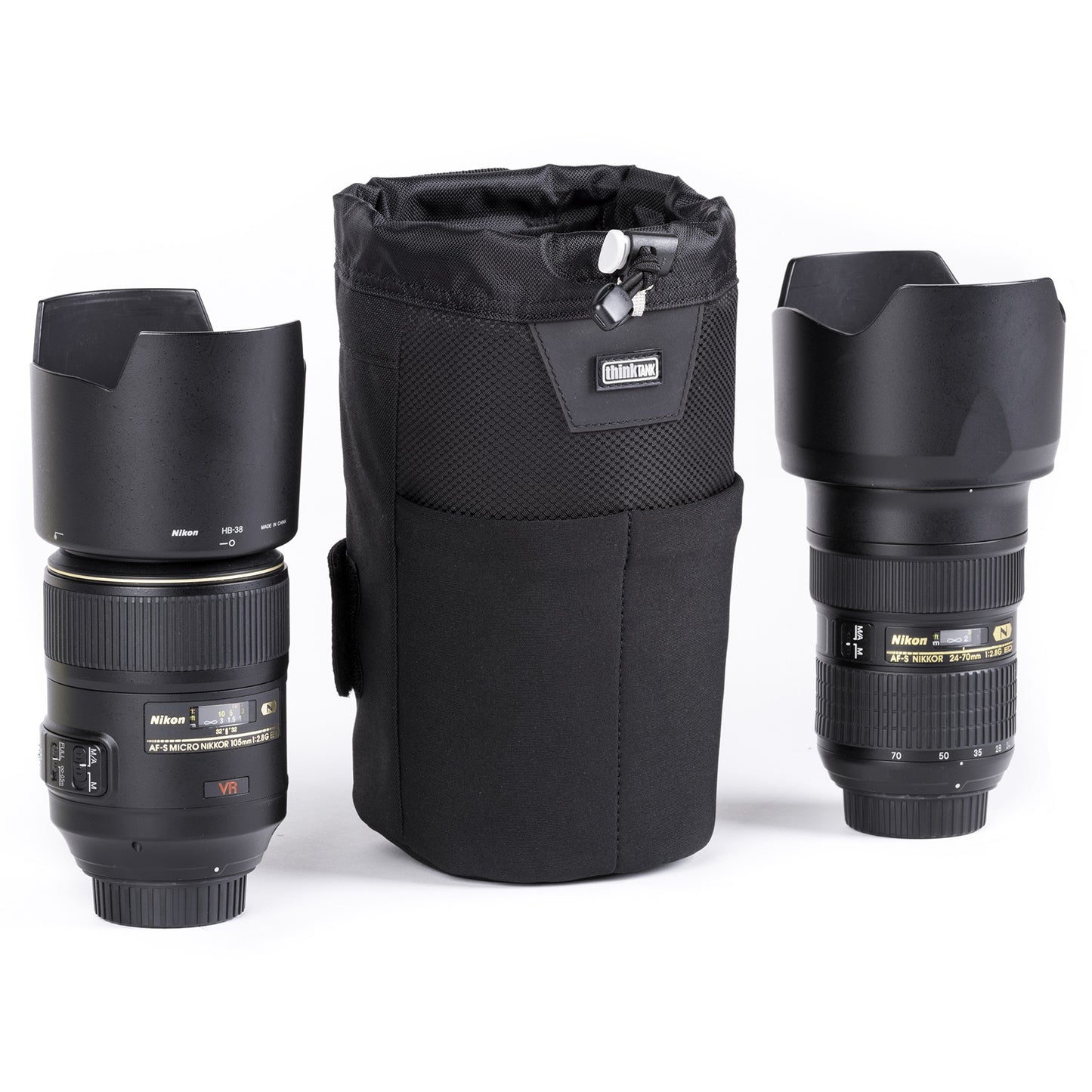 Holds a 24–70mm f/2.8 lens with lens hood in shooting position, or other similar size lenses